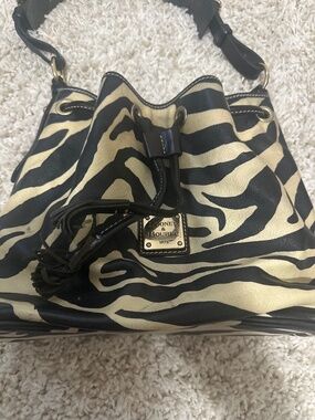 Vintage Dooney & Bourke zebra-print drawstring bucket bag
